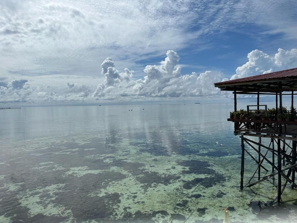 Ferienwohnung Mabul Backpackers Mabul Island Exterior foto